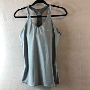 Nike dri fit size medium racer back build in Bra gray with green dots